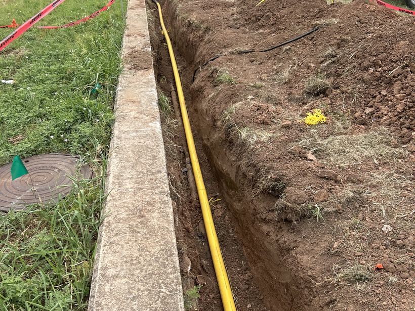 Gas line trenching with the Double R service truck on site